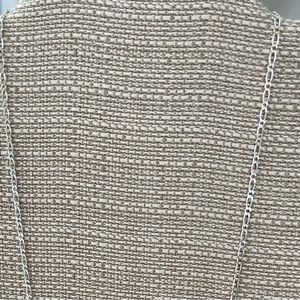 .925 Sterling Silver chain.